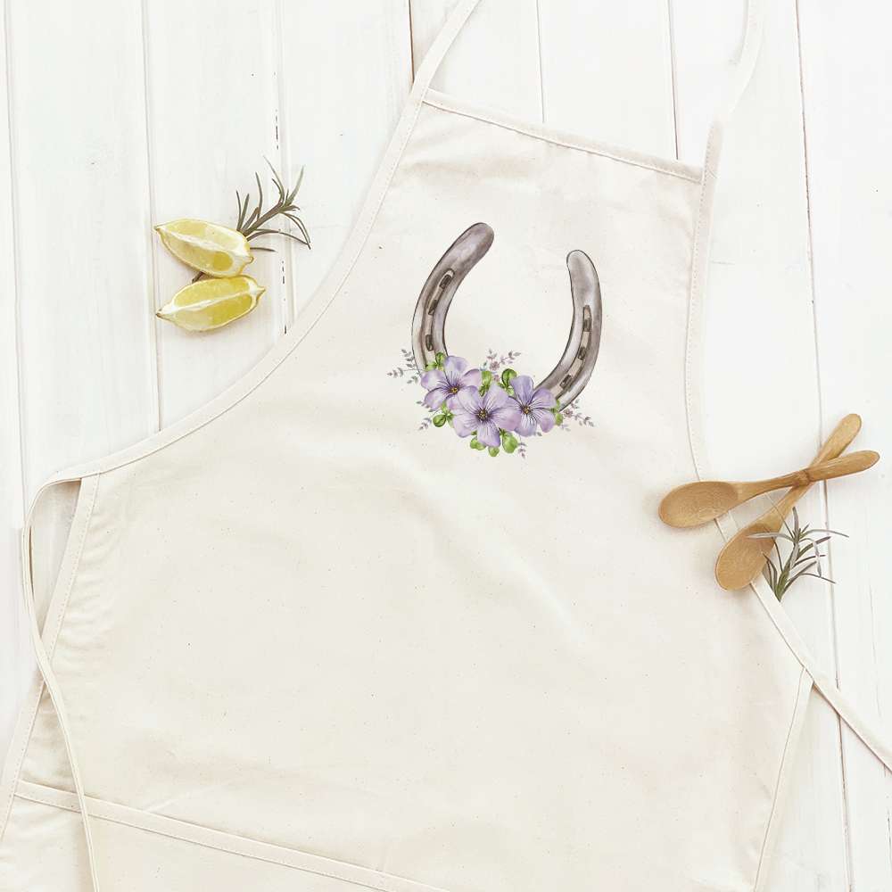 Floral Horseshoe Women's Apron featuring elegant floral design, adjustable neck, and divided front pocket, made from durable cotton canvas.