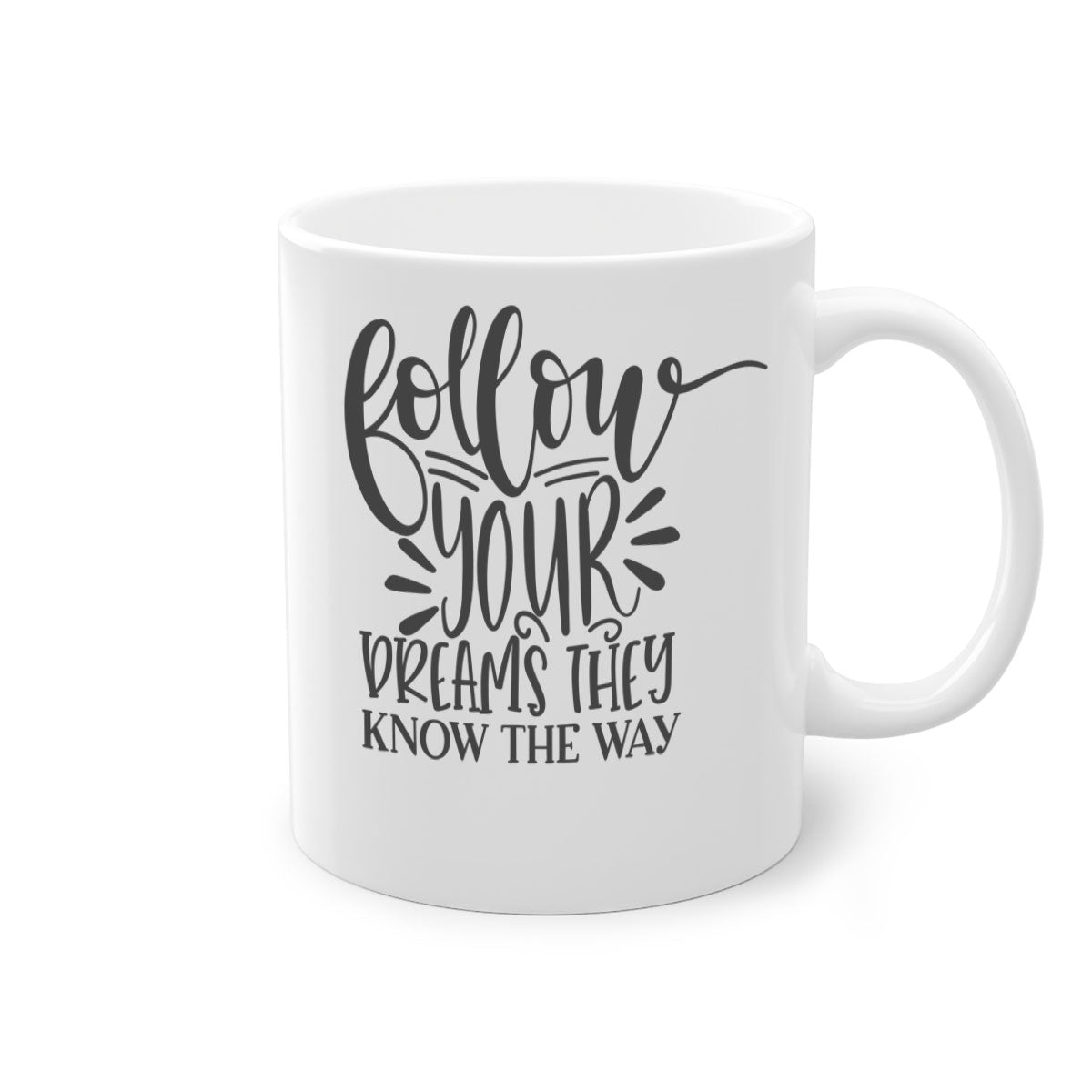 A two-tone ceramic mug with the motivational phrase 'Follow Your Dreams They Know the Way', featuring a glossy finish and a colored handle.