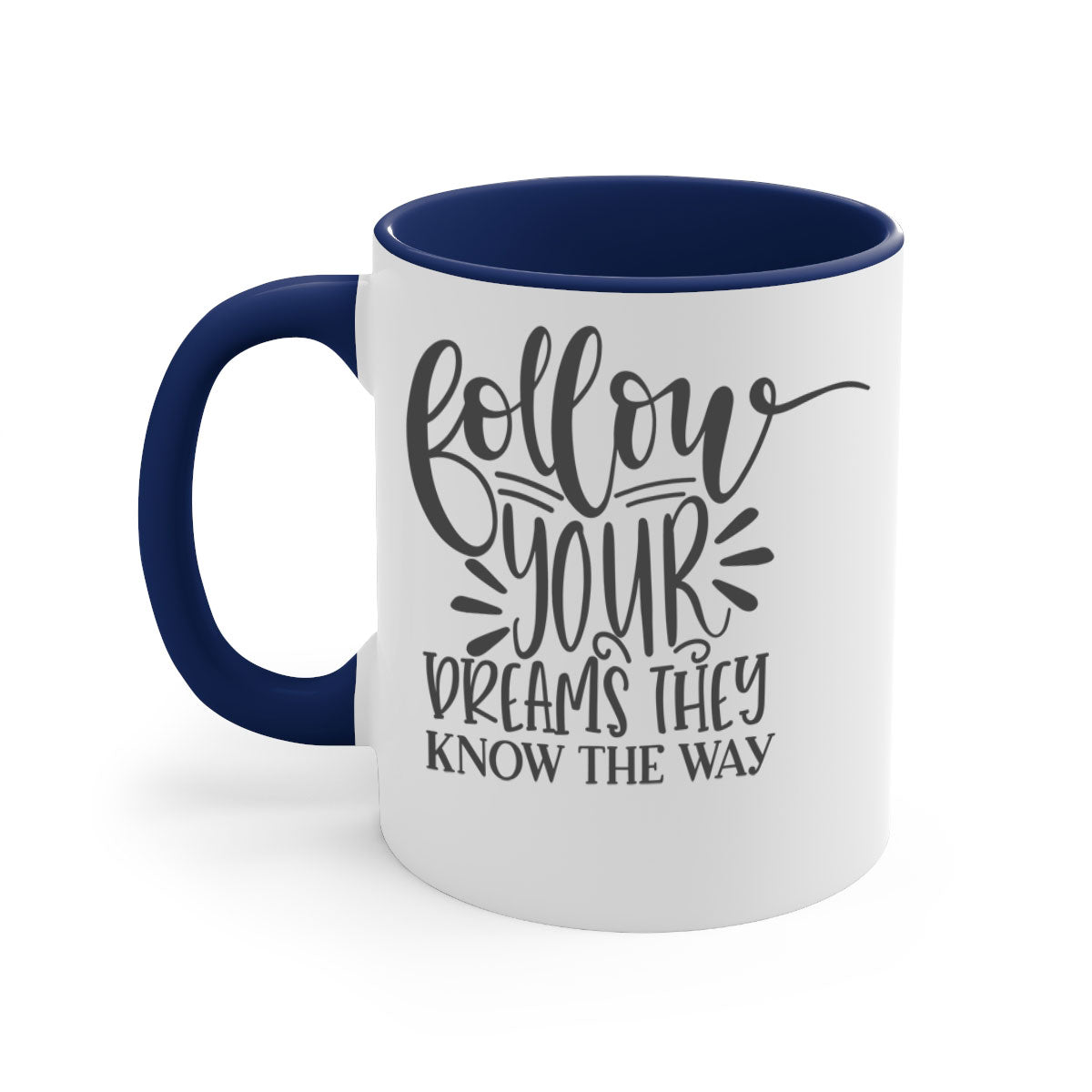 A two-tone ceramic mug with the motivational phrase 'Follow Your Dreams They Know the Way', featuring a glossy finish and a colored handle.