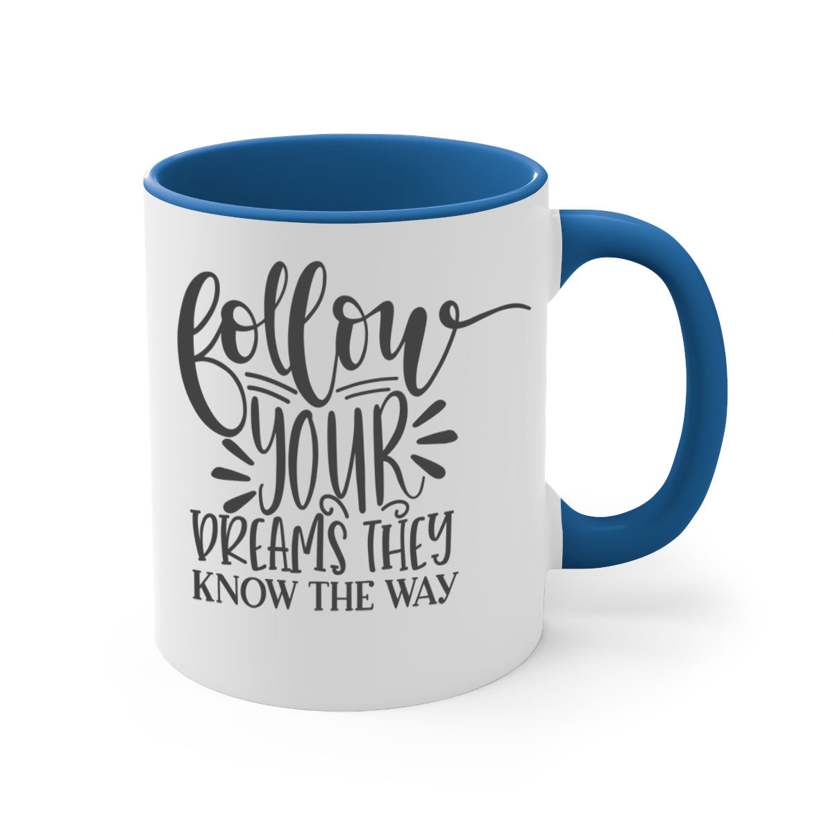 A two-tone ceramic mug with the motivational phrase 'Follow Your Dreams They Know the Way', featuring a glossy finish and a colored handle.