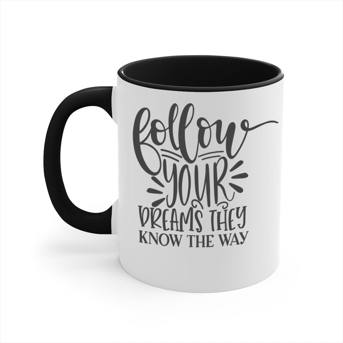 A two-tone ceramic mug with the motivational phrase 'Follow Your Dreams They Know the Way', featuring a glossy finish and a colored handle.
