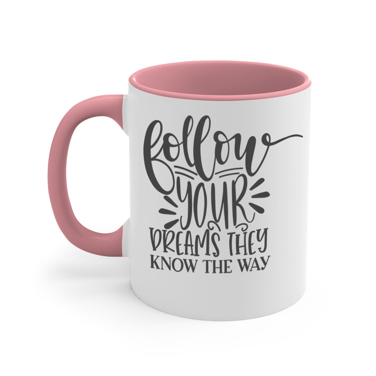 A two-tone ceramic mug with the motivational phrase 'Follow Your Dreams They Know the Way', featuring a glossy finish and a colored handle.