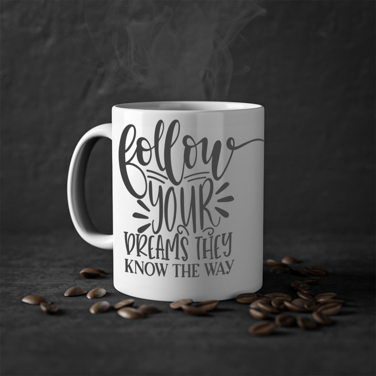 A two-tone ceramic mug with the motivational phrase 'Follow Your Dreams They Know the Way', featuring a glossy finish and a colored handle.