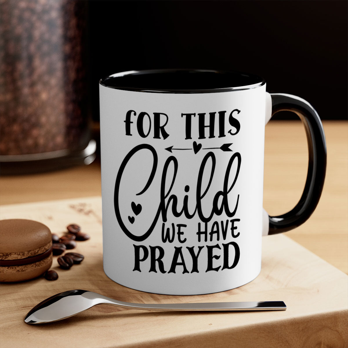 Two-tone ceramic mug with 'For This Child We Have Prayed' design, featuring a colored handle and glossy finish.