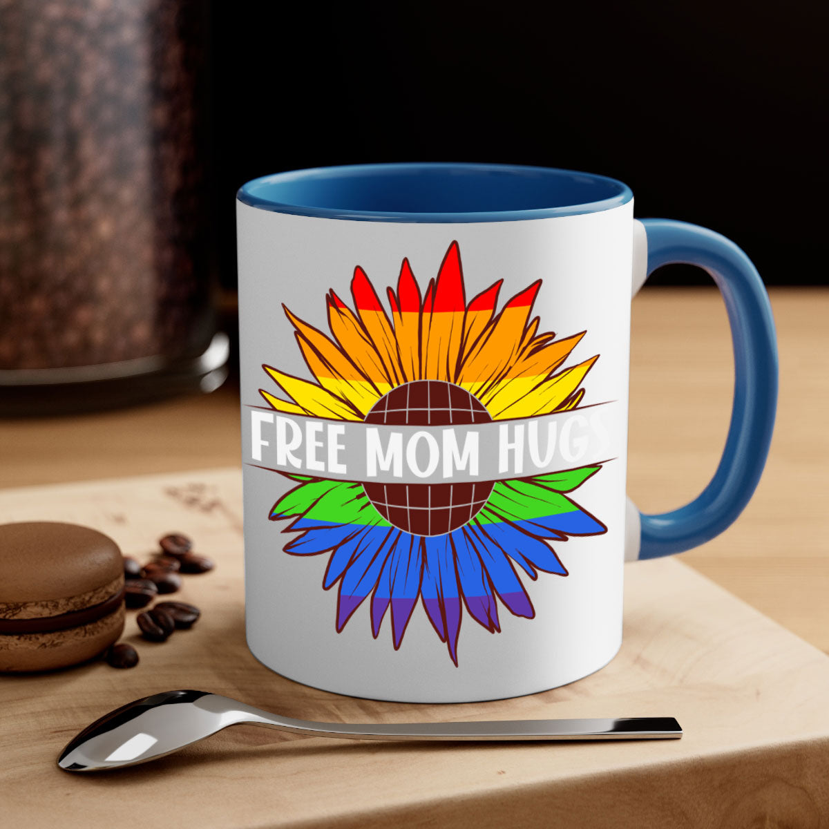 Free Mom Hugs LGBT Daisy Mug with colorful handle and interior, showcasing a daisy design and glossy finish.