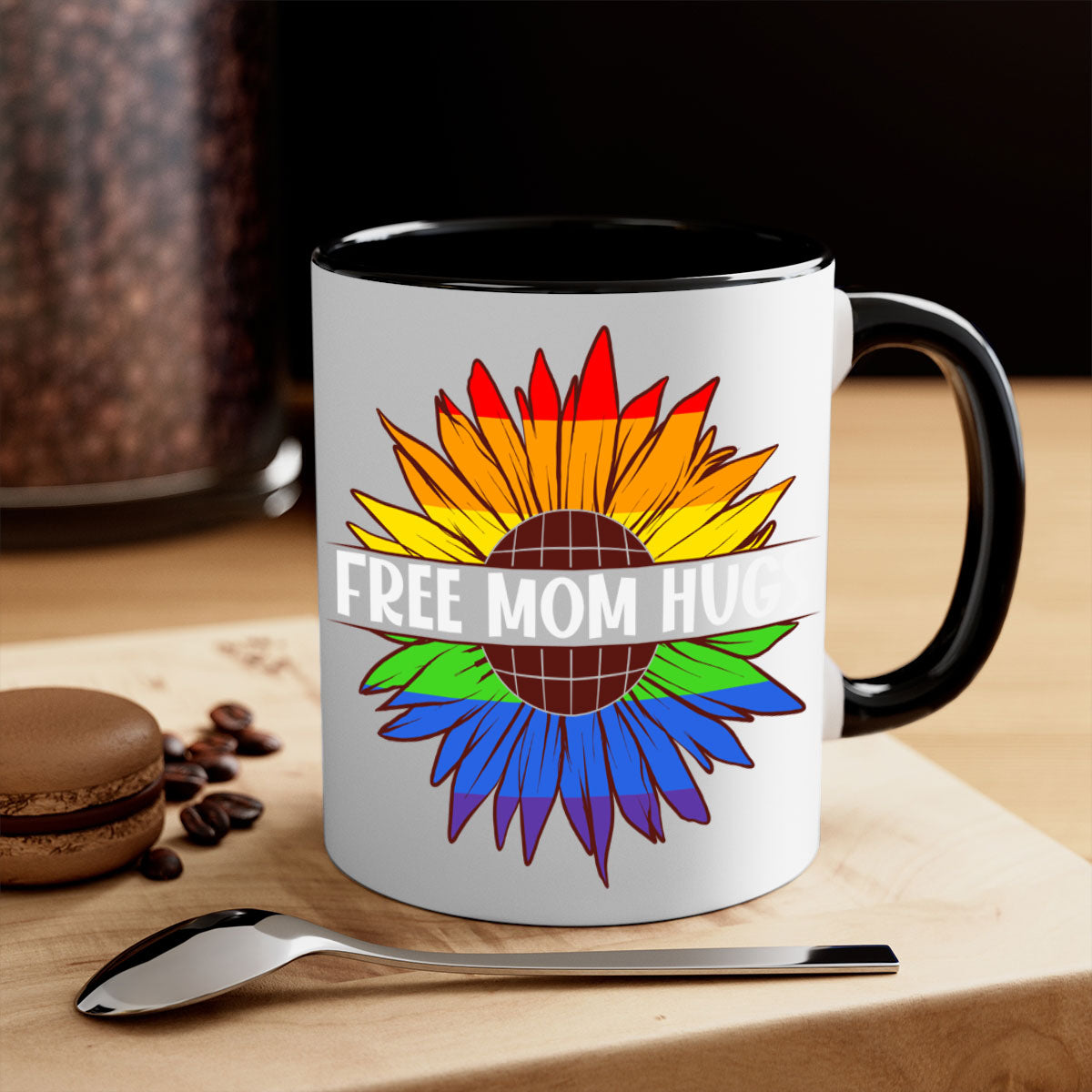 Free Mom Hugs LGBT Daisy Mug with colorful handle and interior, showcasing a daisy design and glossy finish.