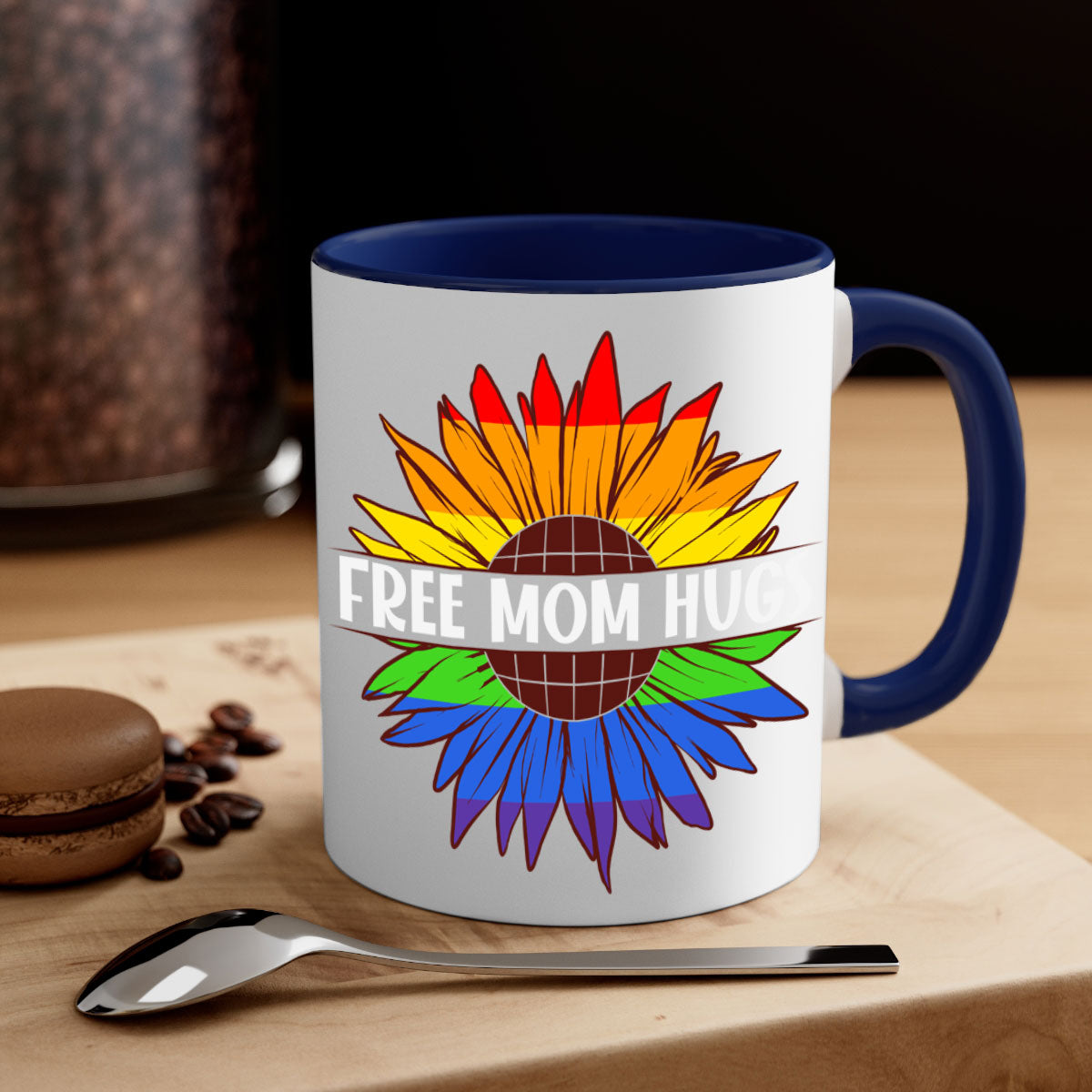 Free Mom Hugs LGBT Daisy Mug with colorful handle and interior, showcasing a daisy design and glossy finish.