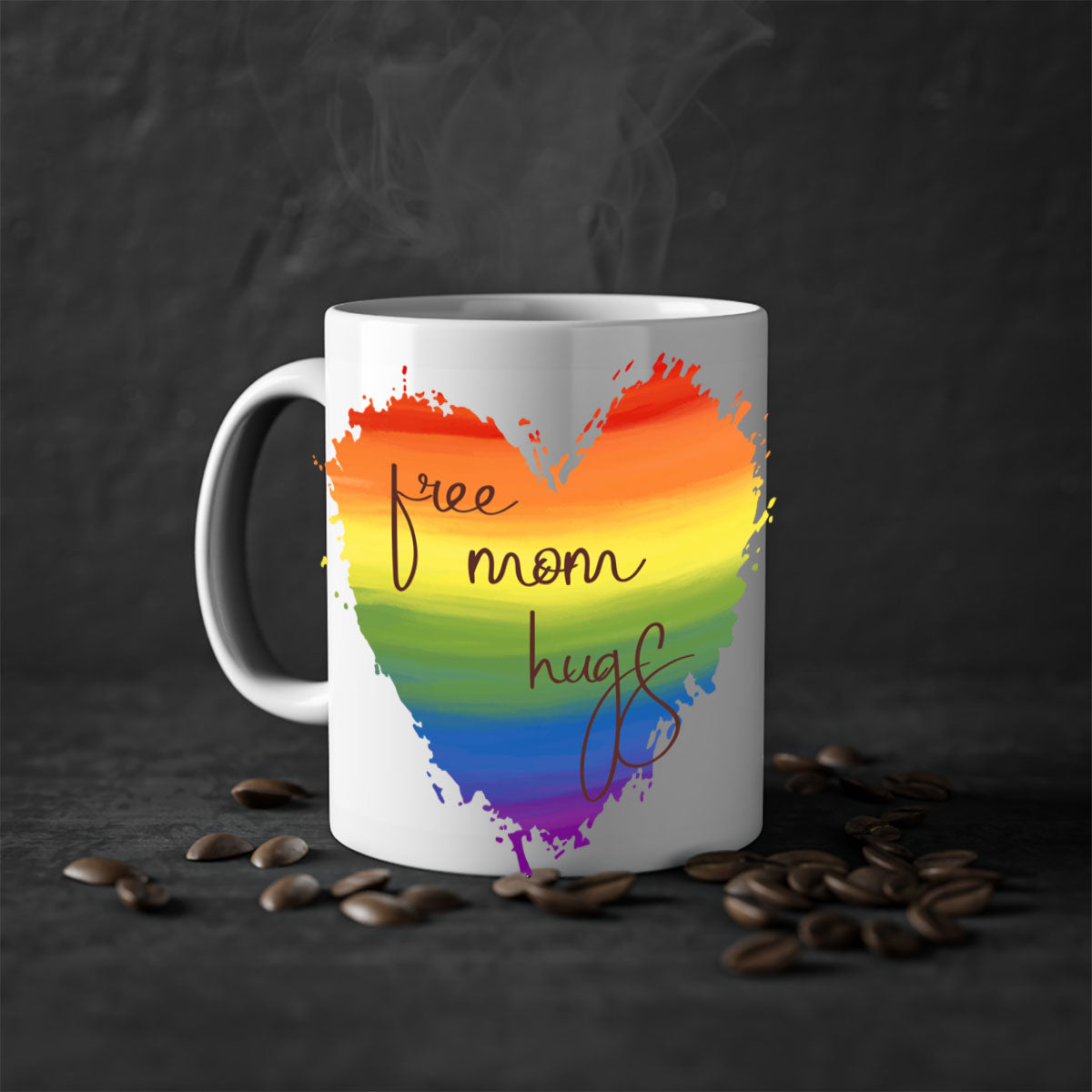 Free Mom Hugs Rainbow Pride Mug with colorful handle and glossy finish, showcasing vibrant rainbow design for LGBT pride.
