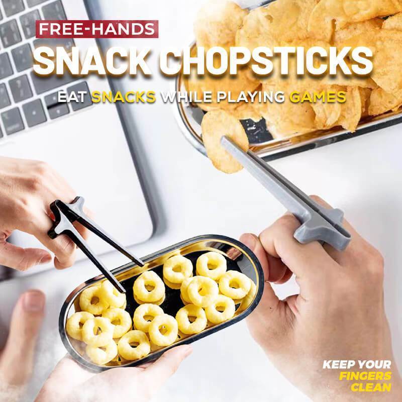 A pair of colorful Free-Hands Snack Chopsticks designed for hands-free snacking, showcasing their unique finger holes and durable plastic material.