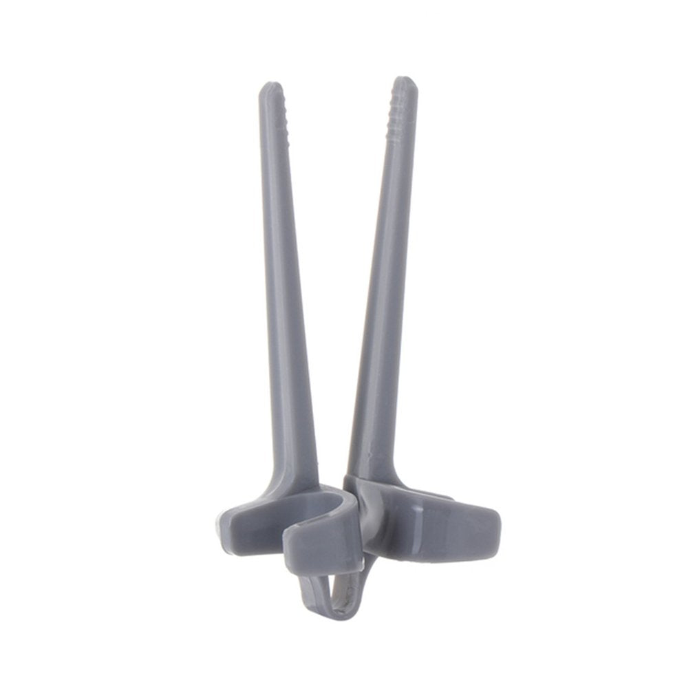 A pair of colorful Free-Hands Snack Chopsticks designed for hands-free snacking, showcasing their unique finger holes and durable plastic material.