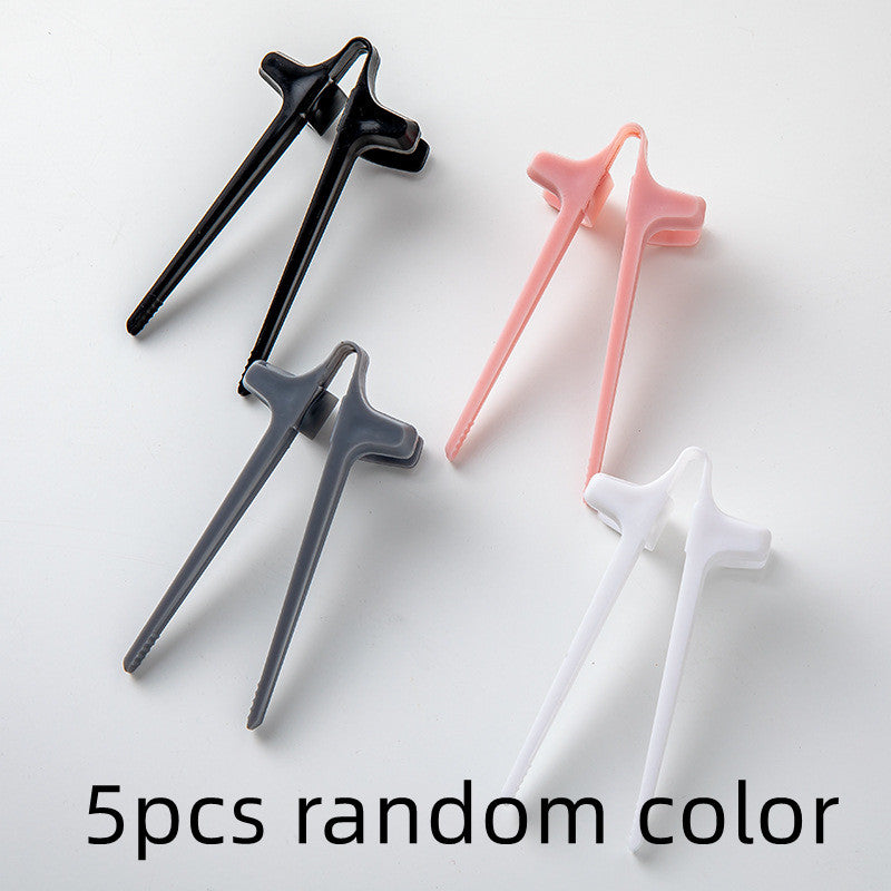 A pair of colorful Free-Hands Snack Chopsticks designed for hands-free snacking, showcasing their unique finger holes and durable plastic material.