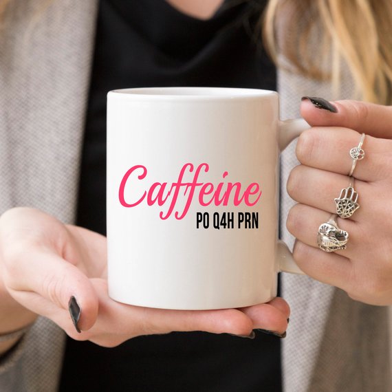Funny Nurse Mug featuring 'Caffeine P0 Q4H PRN' text, 11 oz size, ideal for coffee lovers and nurses.