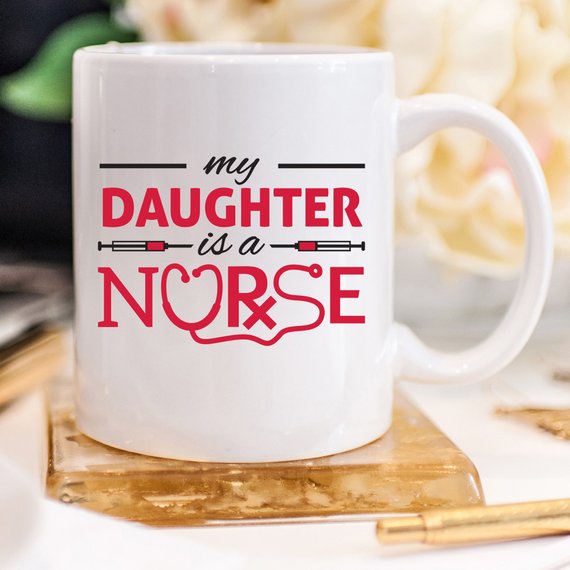 Funny Nurse Mug featuring the text 'My Daughter Is A Nurse', perfect for coffee lovers.