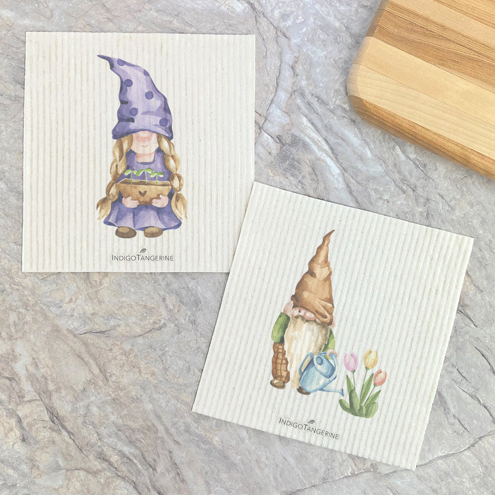 Two Swedish dish cloths featuring a charming garden gnome design, made from eco-friendly materials.