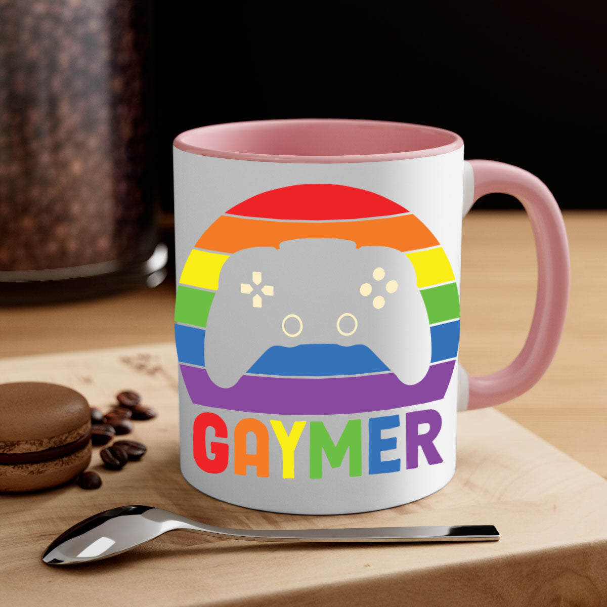 A vibrant gaymer LGBT gamer mug featuring a rainbow flag design with a glossy finish and a colored handle.