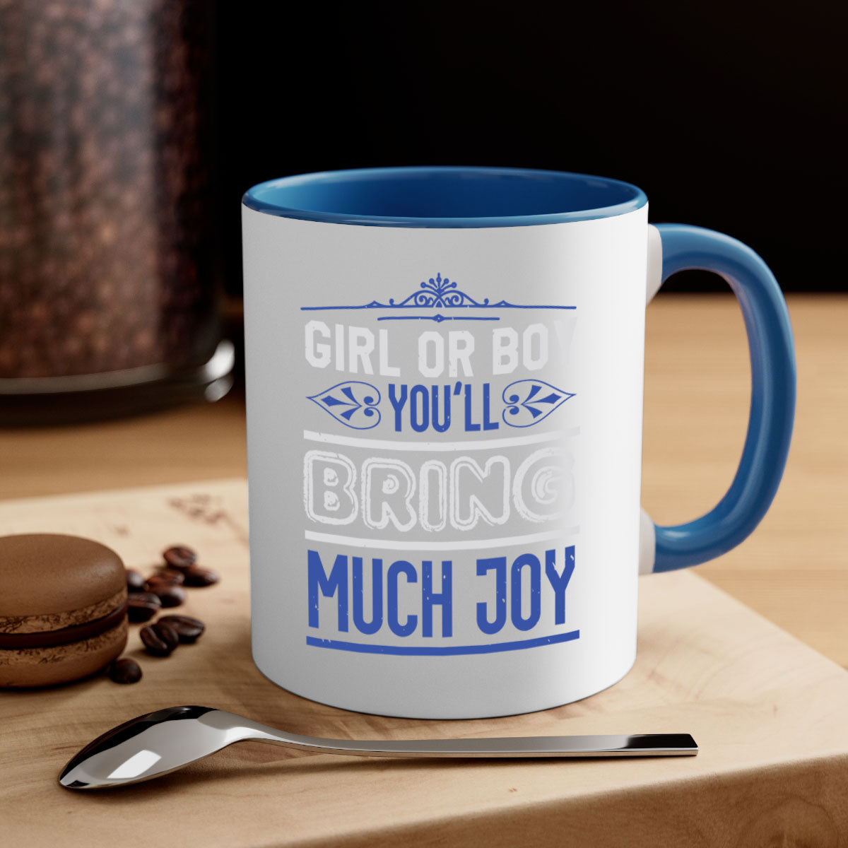 Two-tone ceramic mug with colorful handle and interior, featuring the text 'Gilr or boy you bring much joy' for baby showers.