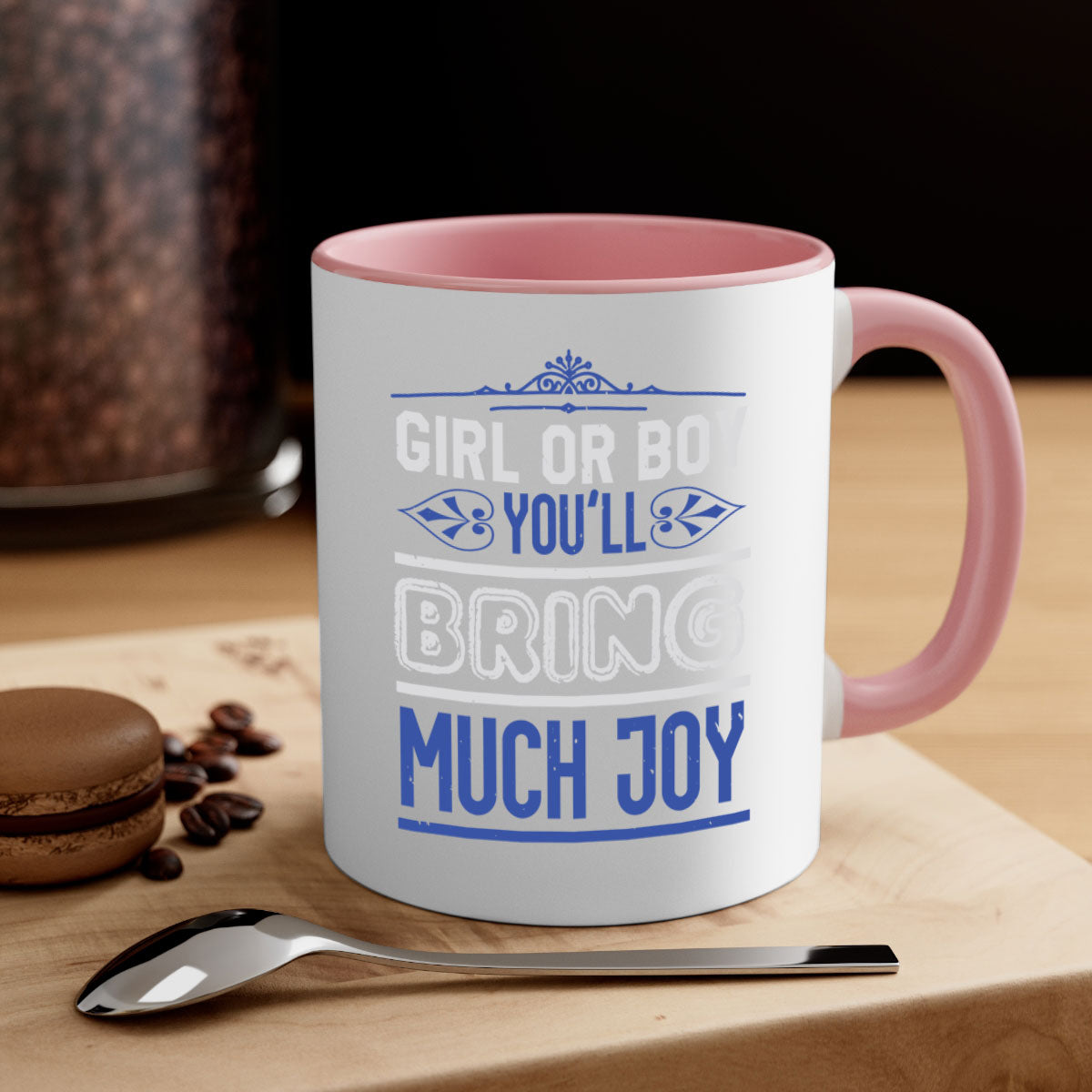 Two-tone ceramic mug with colorful handle and interior, featuring the text 'Gilr or boy you bring much joy' for baby showers.