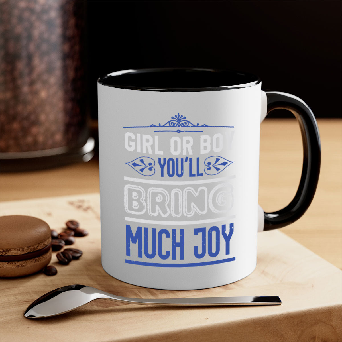 Two-tone ceramic mug with colorful handle and interior, featuring the text 'Gilr or boy you bring much joy' for baby showers.