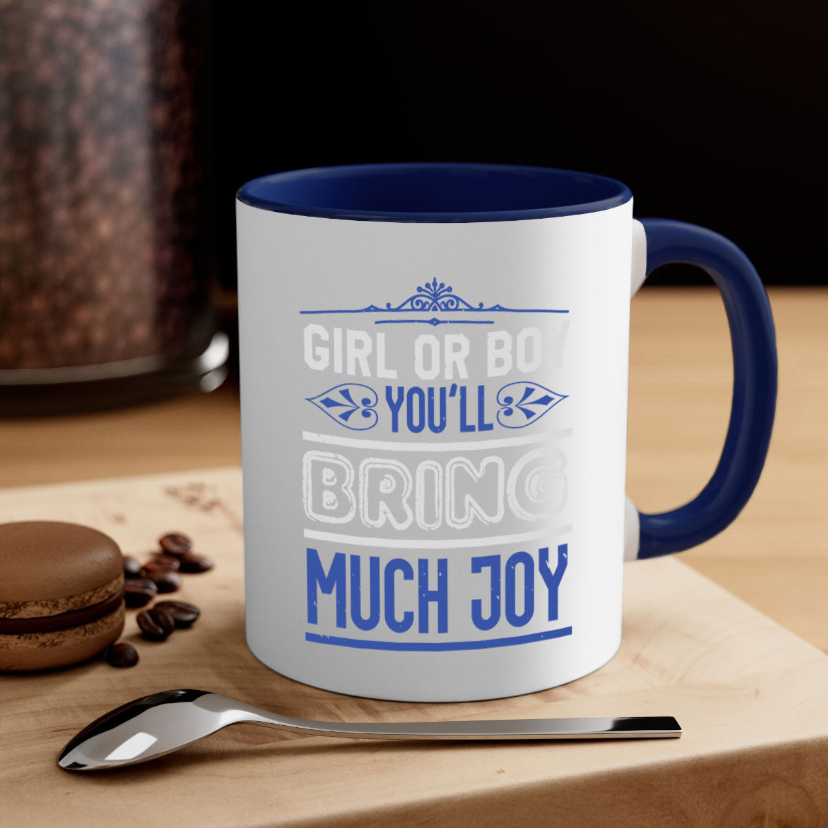 Two-tone ceramic mug with colorful handle and interior, featuring the text 'Gilr or boy you bring much joy' for baby showers.