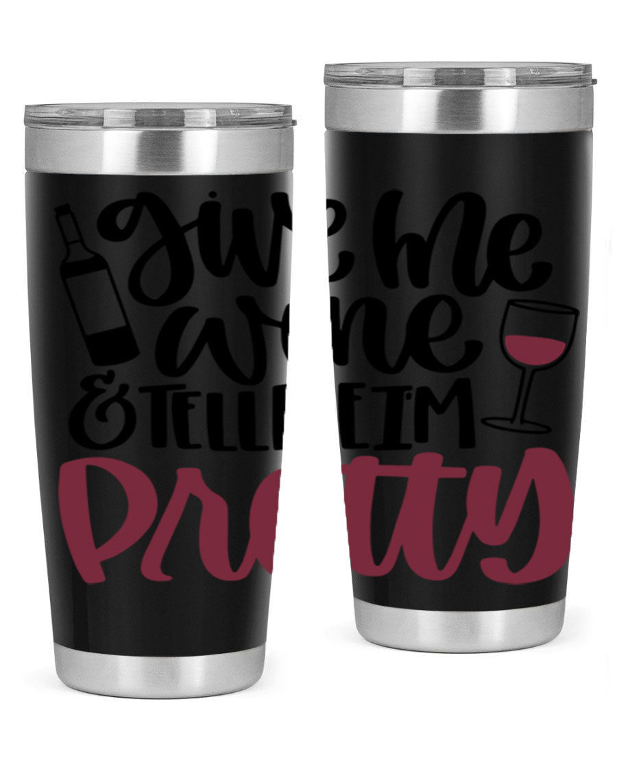 A stylish stainless steel tumbler with the phrase 'Give Me Wine Tell Me I'm Pretty', featuring a double wall vacuum design and a drink-thru lid.