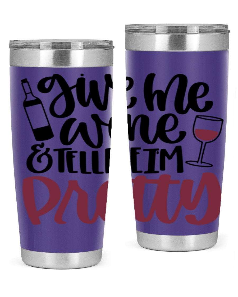 A stylish stainless steel tumbler with the phrase 'Give Me Wine Tell Me I'm Pretty', featuring a double wall vacuum design and a drink-thru lid.
