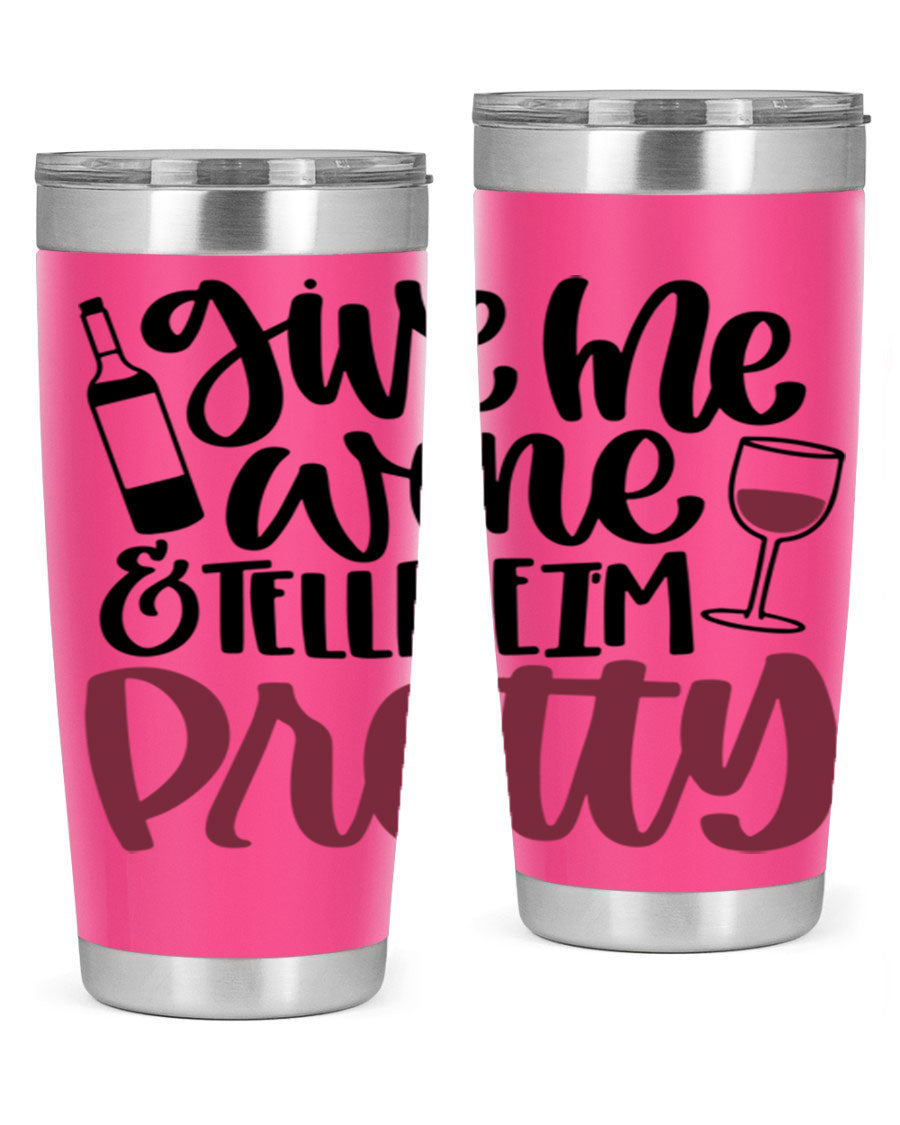 A stylish stainless steel tumbler with the phrase 'Give Me Wine Tell Me I'm Pretty', featuring a double wall vacuum design and a drink-thru lid.