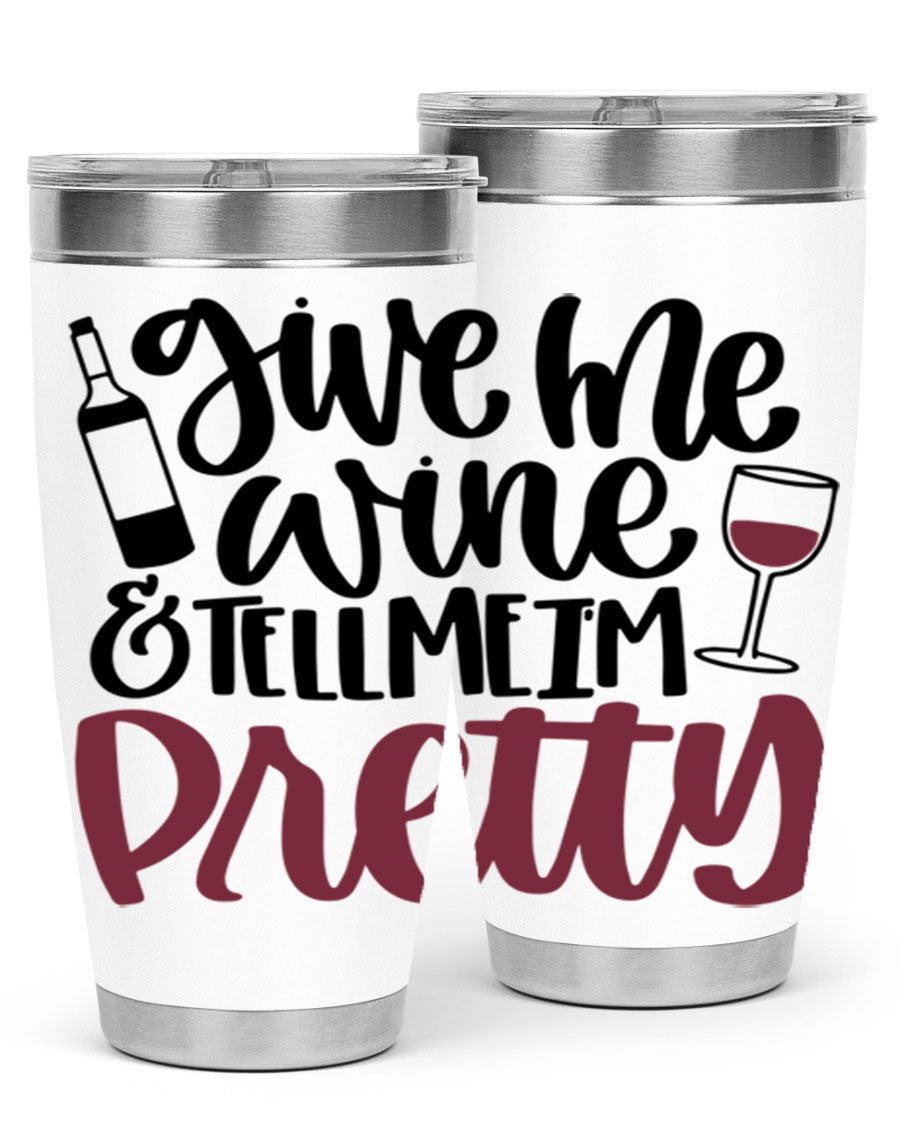 A stylish stainless steel tumbler with the phrase 'Give Me Wine Tell Me I'm Pretty', featuring a double wall vacuum design and a drink-thru lid.