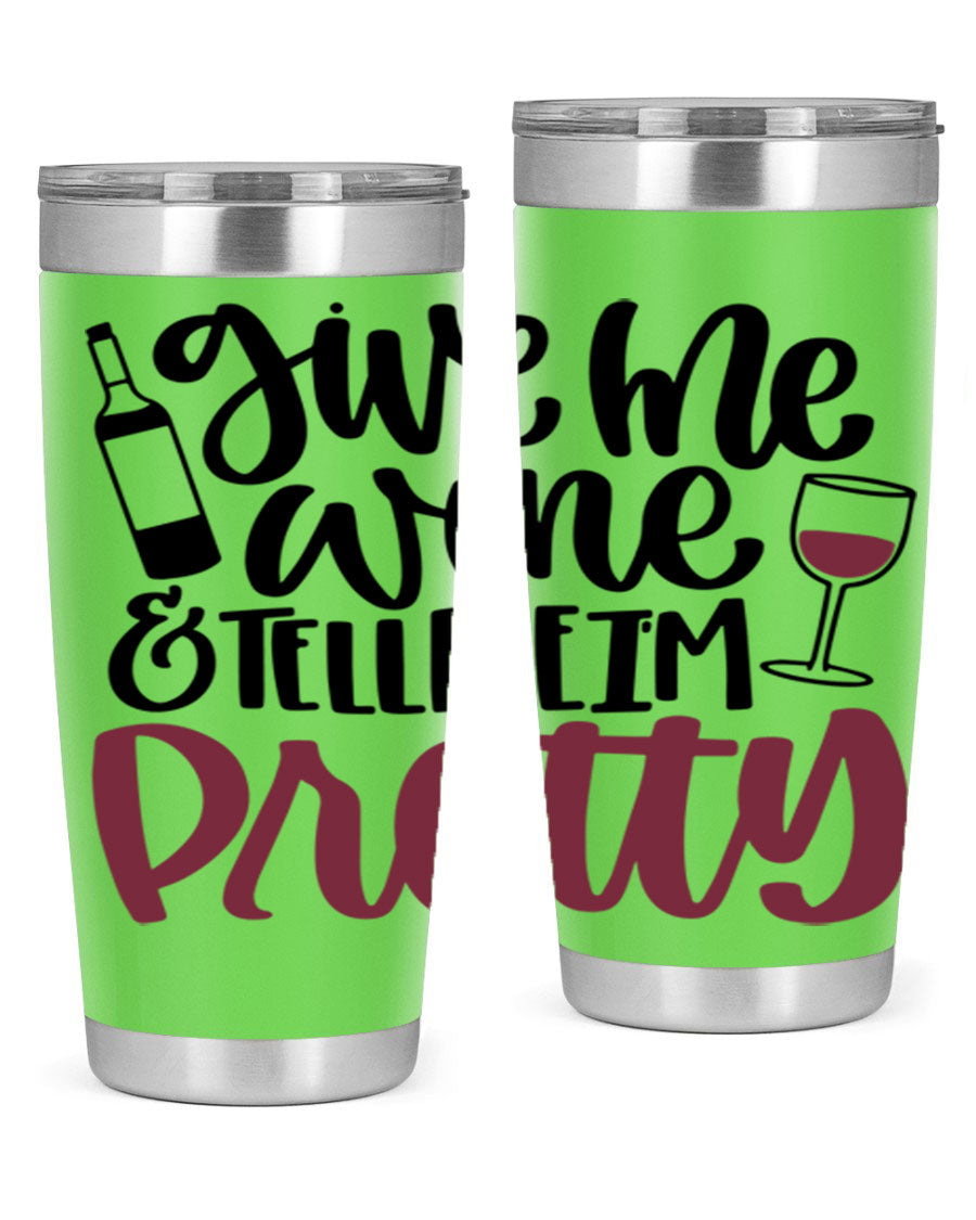 A stylish stainless steel tumbler with the phrase 'Give Me Wine Tell Me I'm Pretty', featuring a double wall vacuum design and a drink-thru lid.
