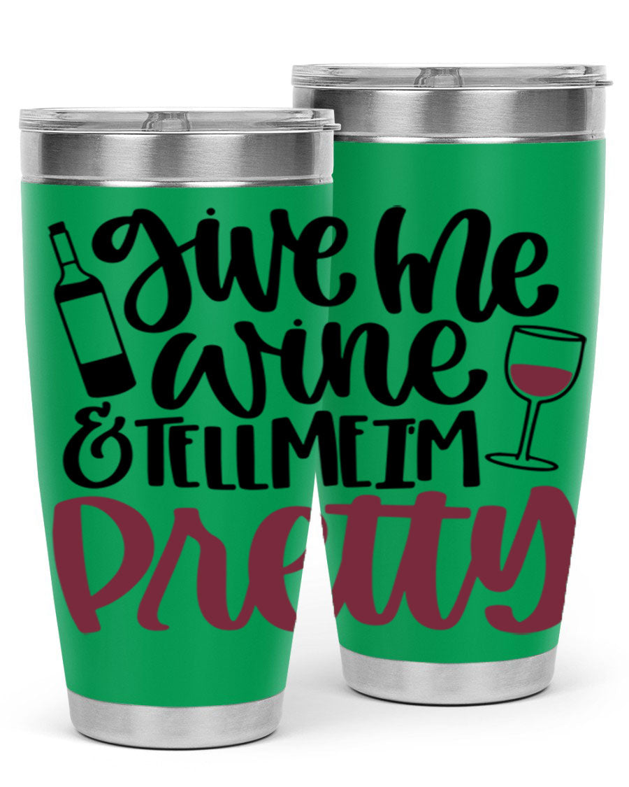 A stylish stainless steel tumbler with the phrase 'Give Me Wine Tell Me I'm Pretty', featuring a double wall vacuum design and a drink-thru lid.