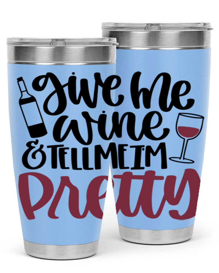 A stylish stainless steel tumbler with the phrase 'Give Me Wine Tell Me I'm Pretty', featuring a double wall vacuum design and a drink-thru lid.