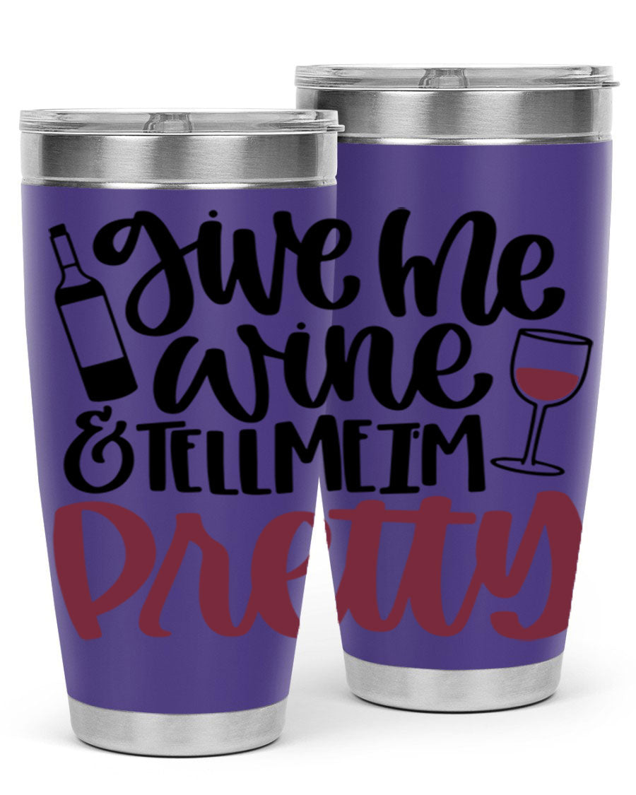 A stylish stainless steel tumbler with the phrase 'Give Me Wine Tell Me I'm Pretty', featuring a double wall vacuum design and a drink-thru lid.