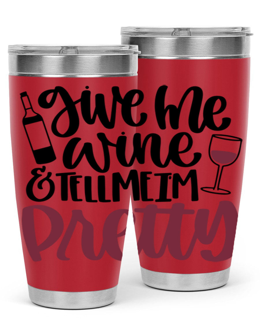 A stylish stainless steel tumbler with the phrase 'Give Me Wine Tell Me I'm Pretty', featuring a double wall vacuum design and a drink-thru lid.