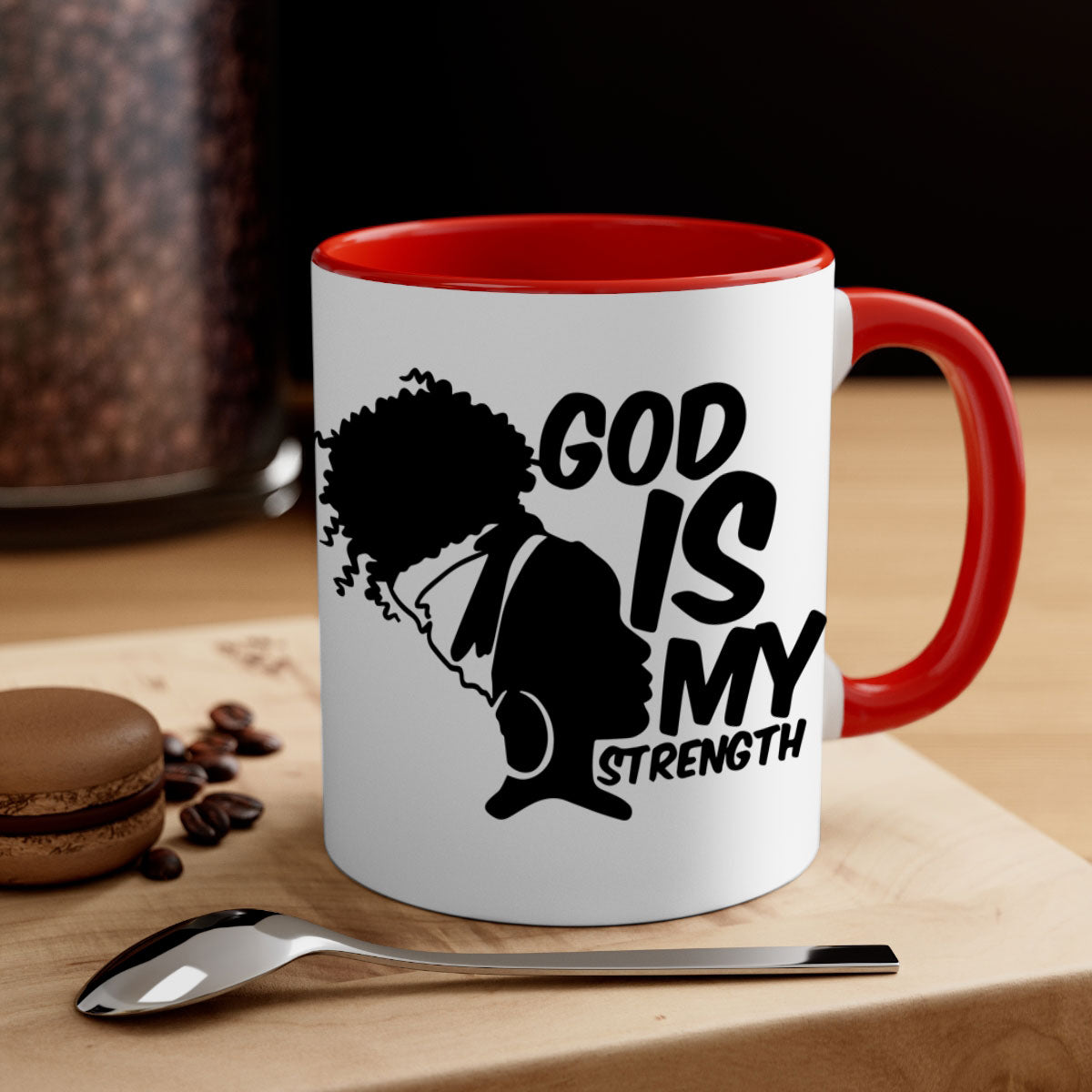 A stylish two-tone ceramic mug with the phrase 'God is My Strength' in black letters, featuring a colored handle and glossy finish.