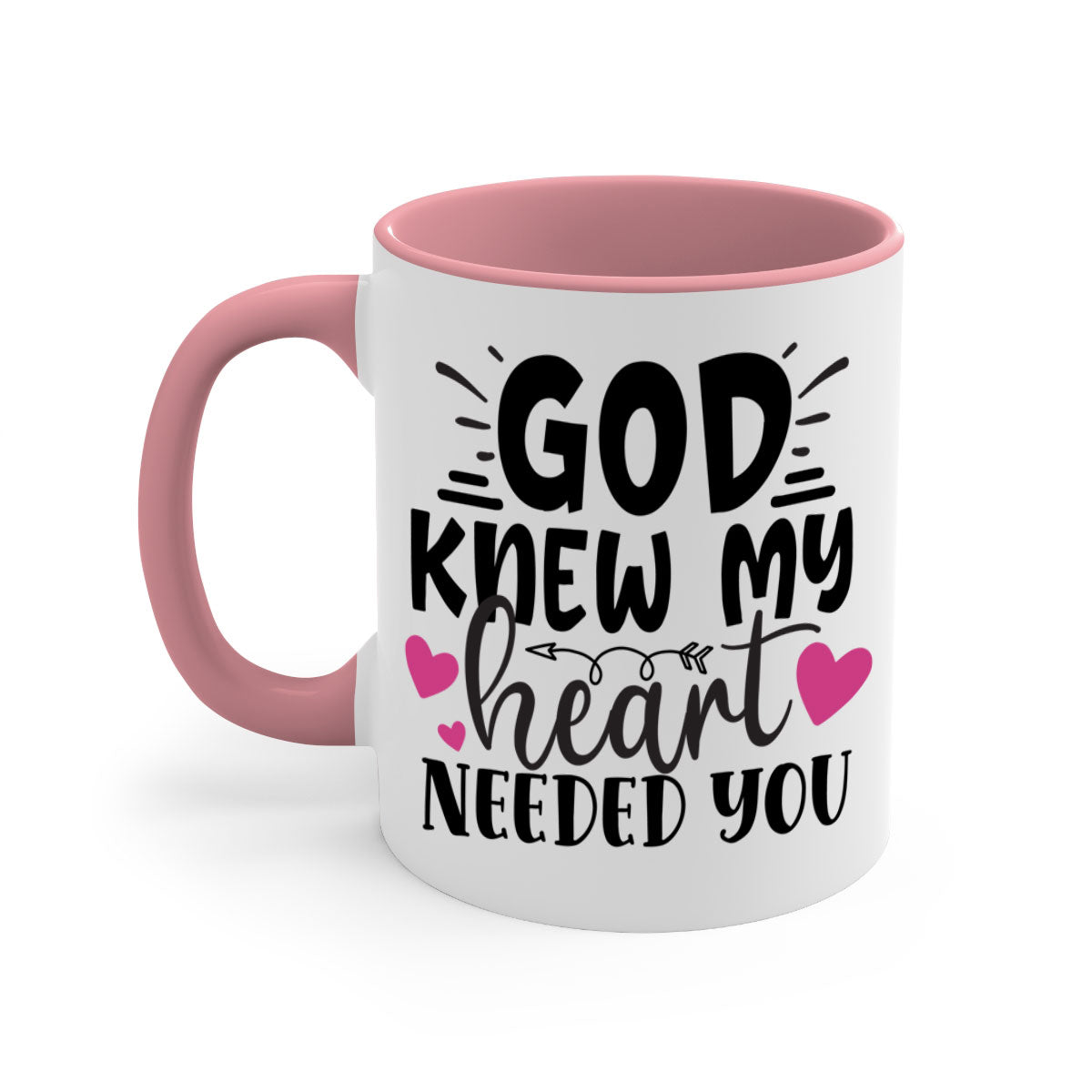 Two-tone ceramic mug with colored handle and glossy finish, featuring the phrase 'God Knew My Heart Needed You'.