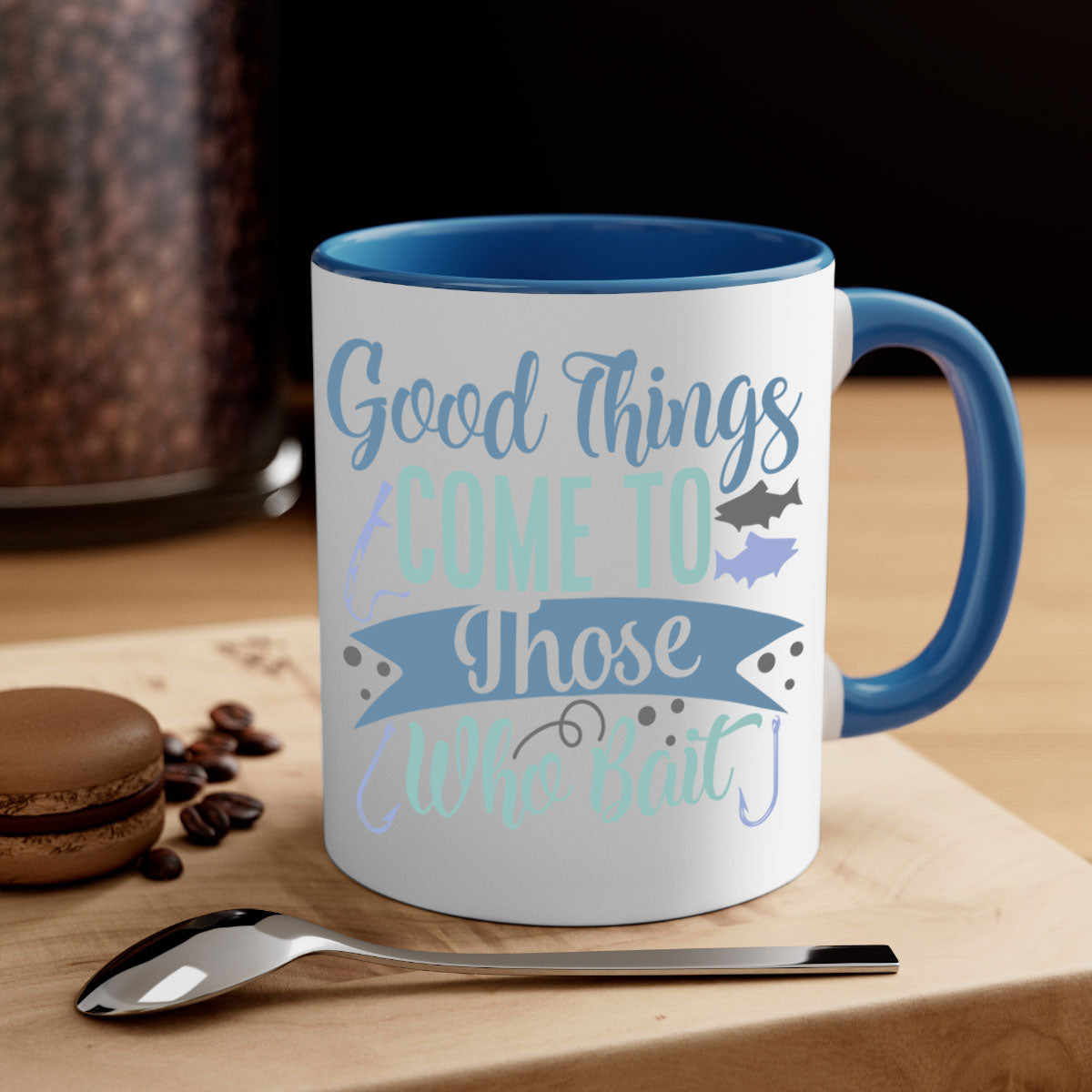 A stylish two-tone fishing mug with a glossy finish, featuring the phrase 'Good Things Come to Those Who Bait' and a comfortable C-shaped handle.