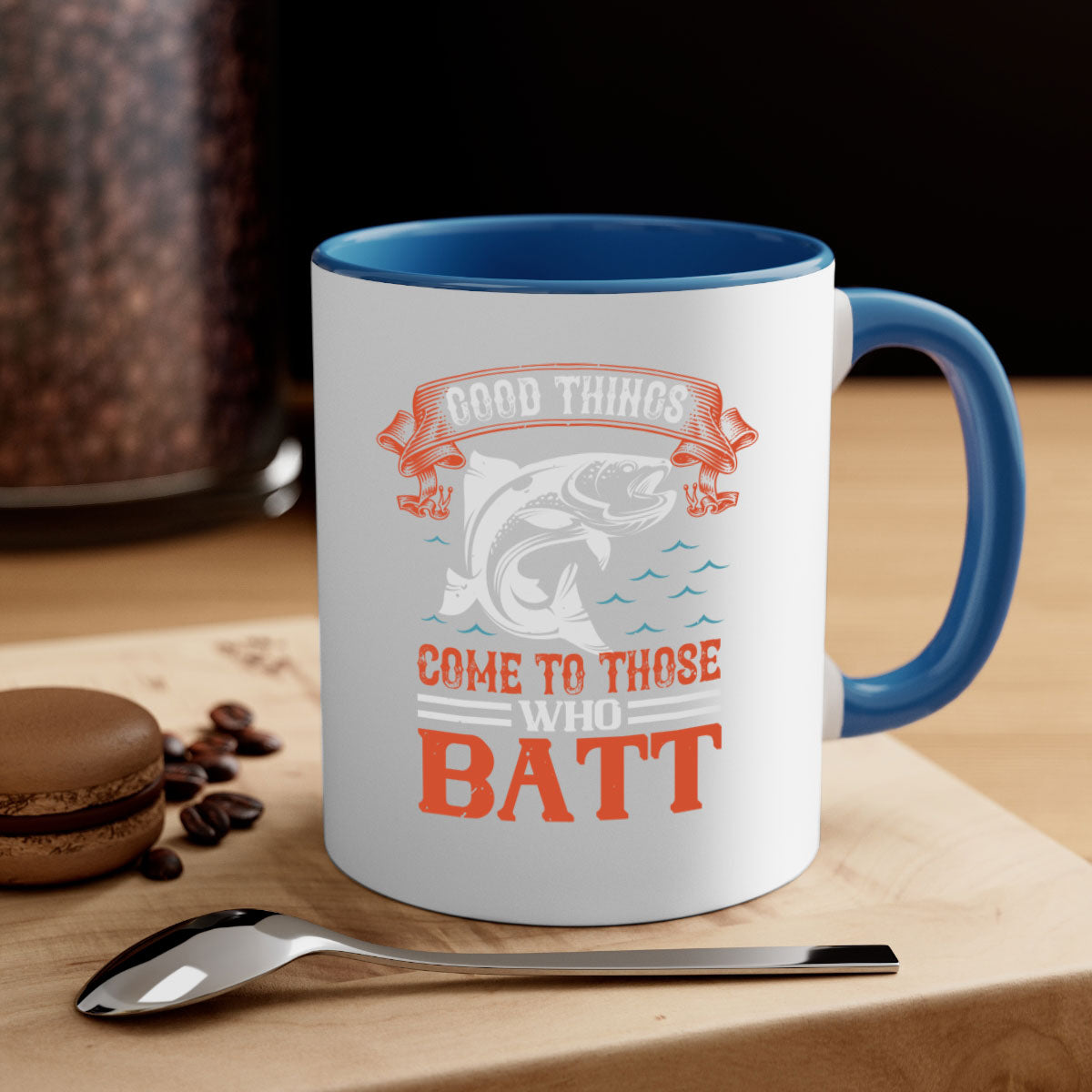 Ceramic coffee mug with 'Good Things Come to Those Who Batt 130#' design, featuring a colored handle and glossy finish.