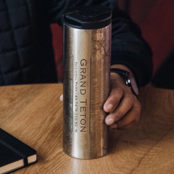Custom engraved stainless steel tumbler featuring a detailed map of Grand Teton National Park, Wyoming.