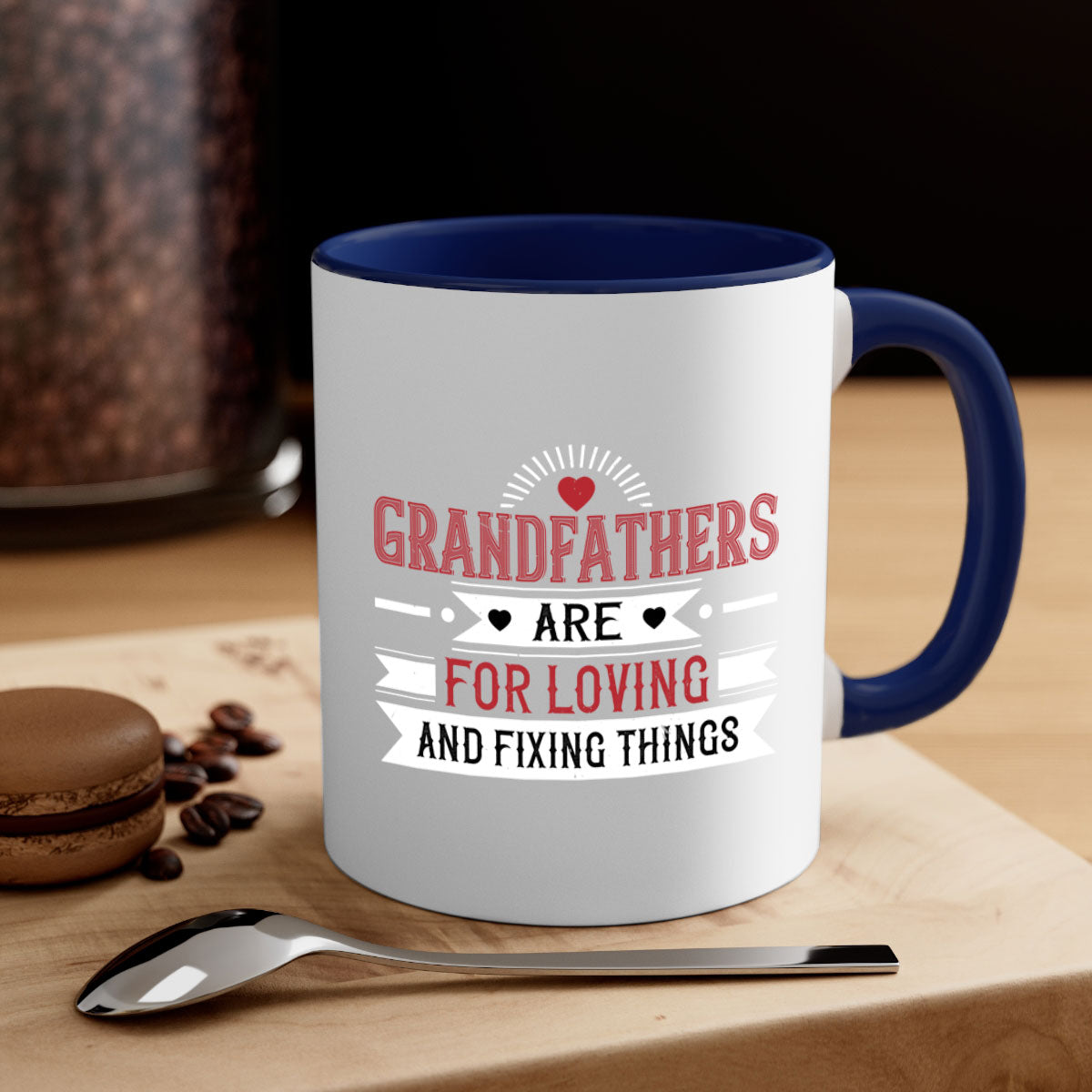 Ceramic mug with a two-tone design featuring the phrase 'Grandfathers are for loving and fixing things', available in multiple colors.