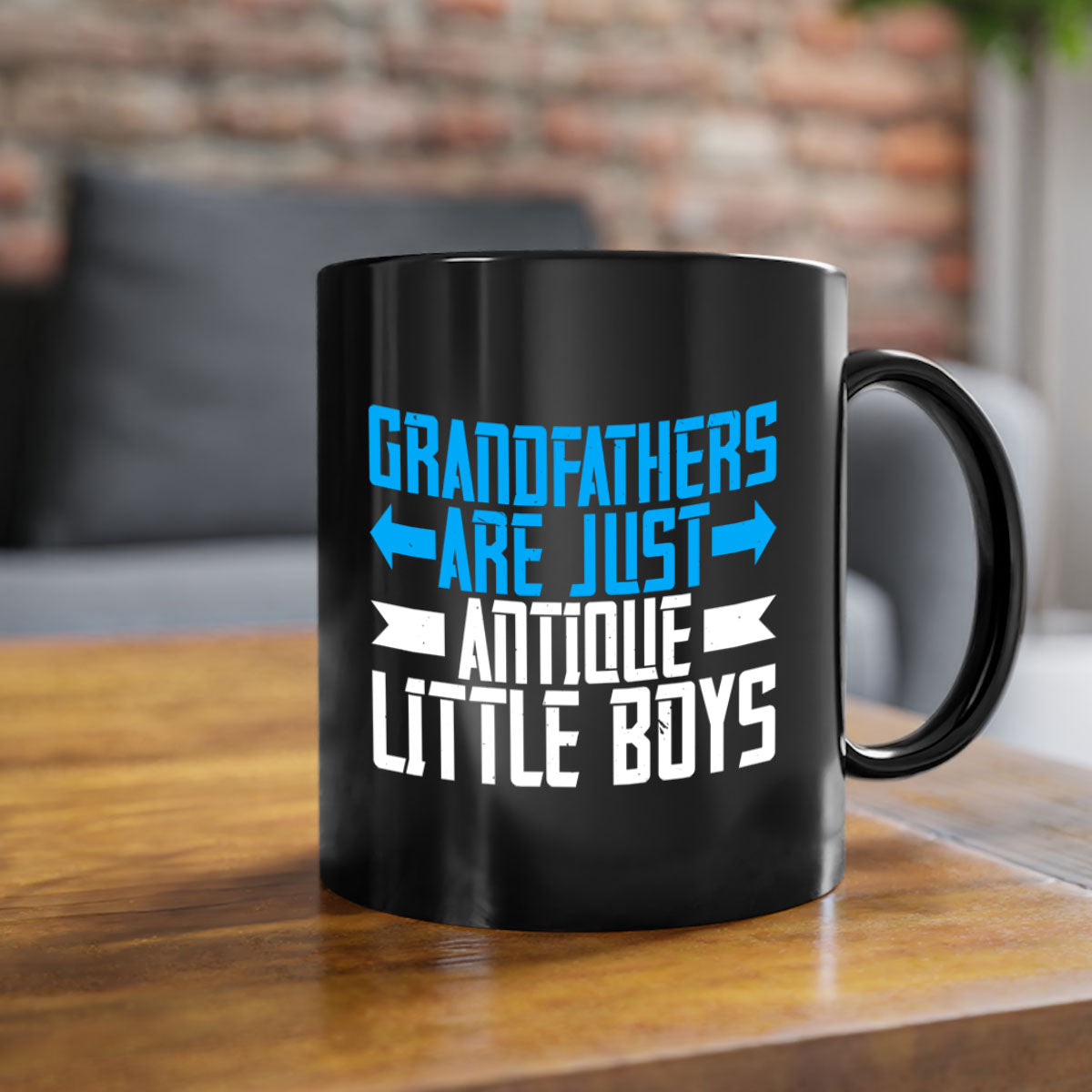Ceramic coffee mug with humorous design featuring the phrase 'Grandfathers are just antique little boys', available in multiple colors.