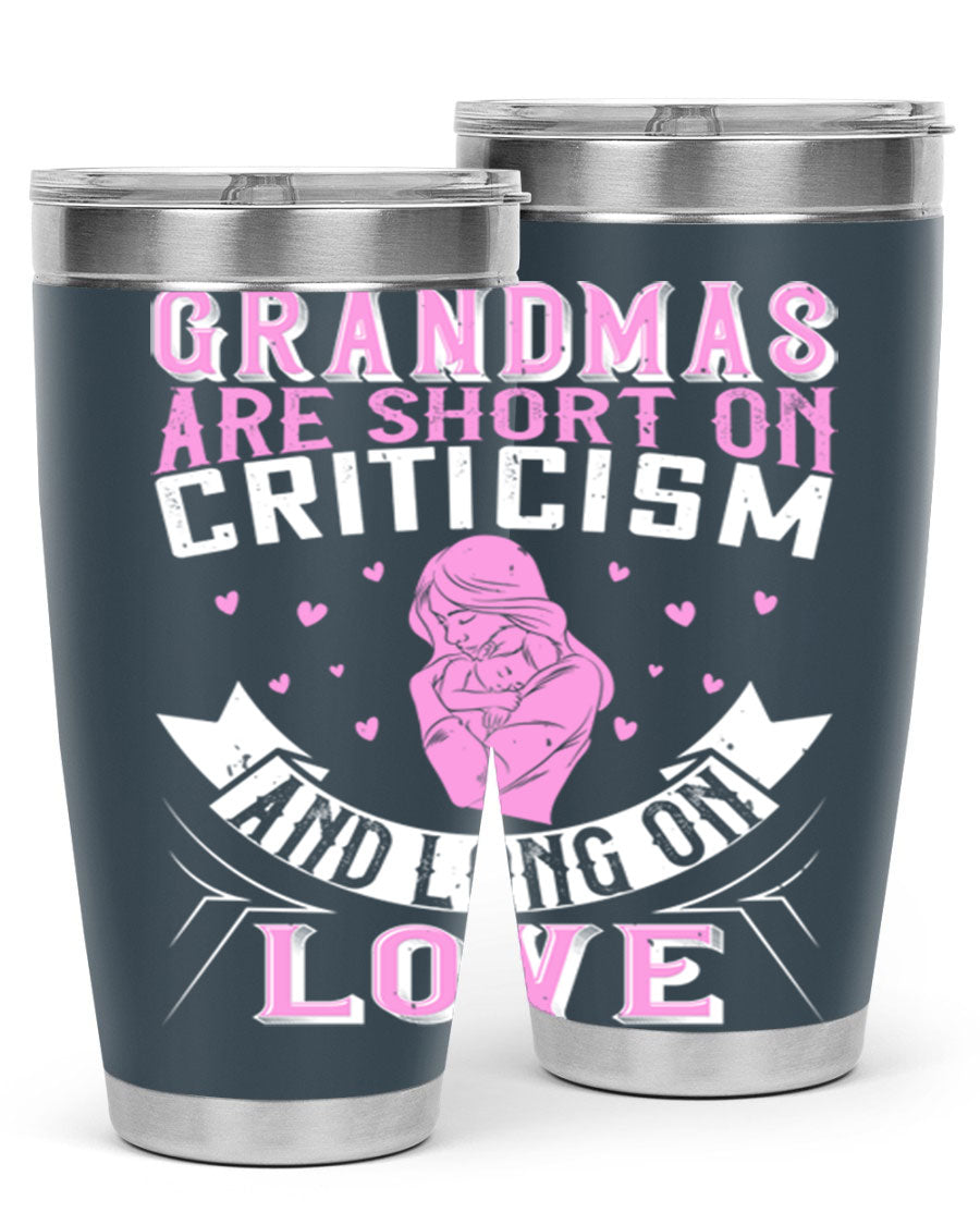 A stylish stainless steel tumbler featuring the phrase 'Grandmas are Short on Criticism and Long on Love', available in 20oz and 30oz sizes.