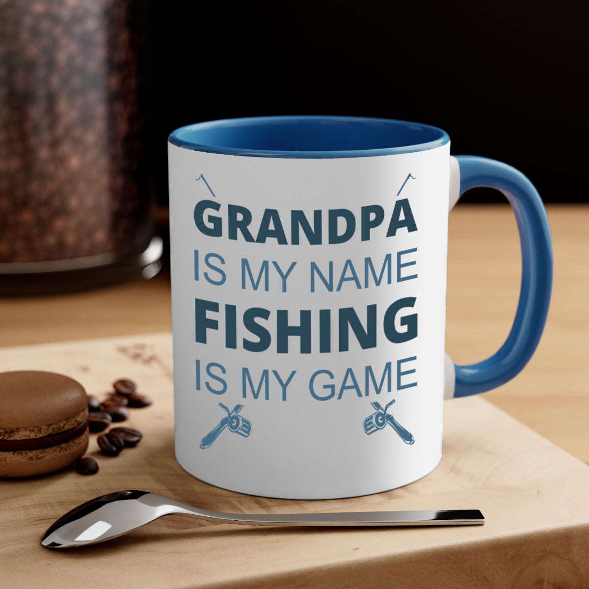 Ceramic fishing mug with 'Grandpa is My Name' design, featuring a colored handle and glossy finish.