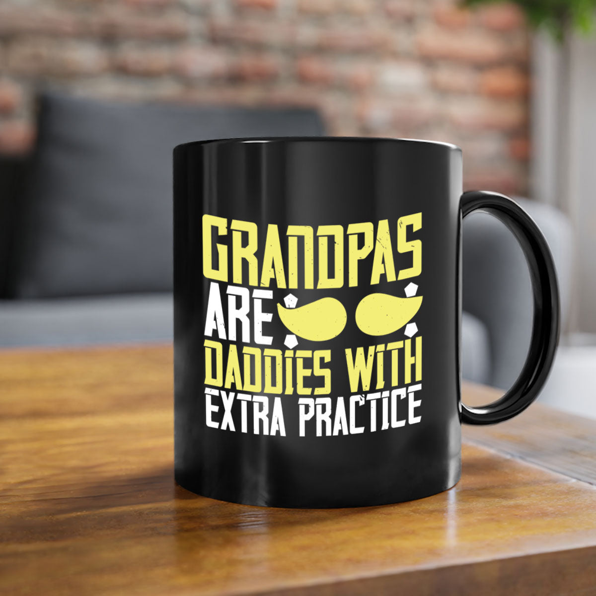 Two-tone ceramic coffee mug with a humorous design saying 'Grandpas are daddies with extra practice', featuring a colored handle and glossy finish.