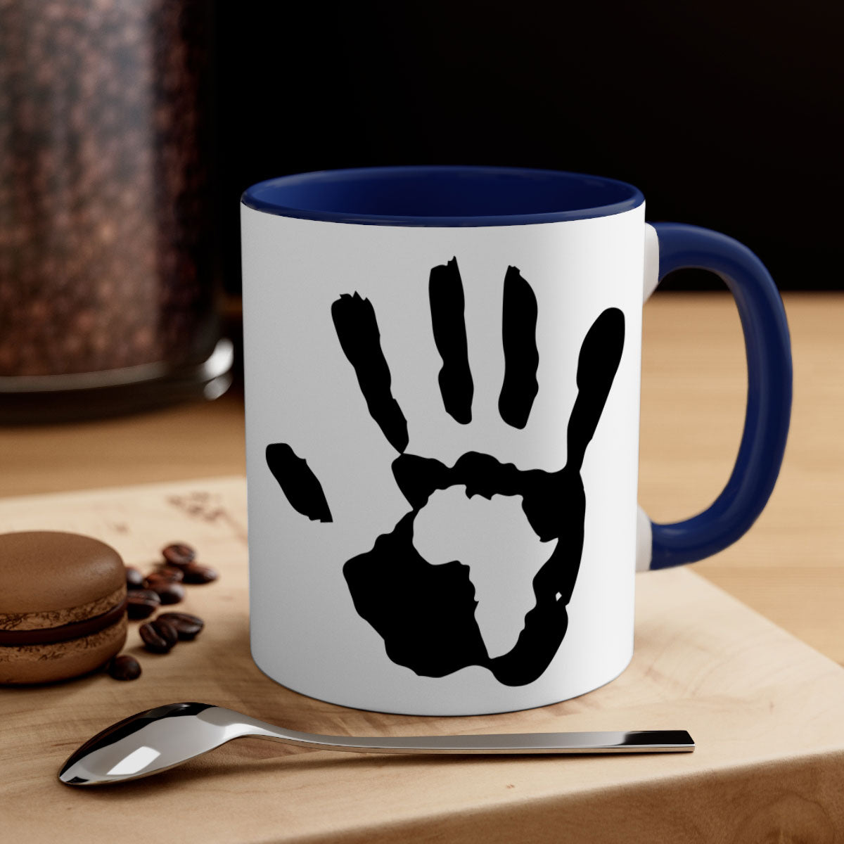 Hand with Africa Mug featuring black words and phrases, available in five colors with a glossy finish and C-shaped handle.