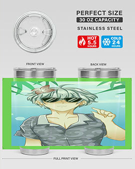 A handsome boy wearing sunglasses, enjoying a summer day at the beach with a stylish tumbler.