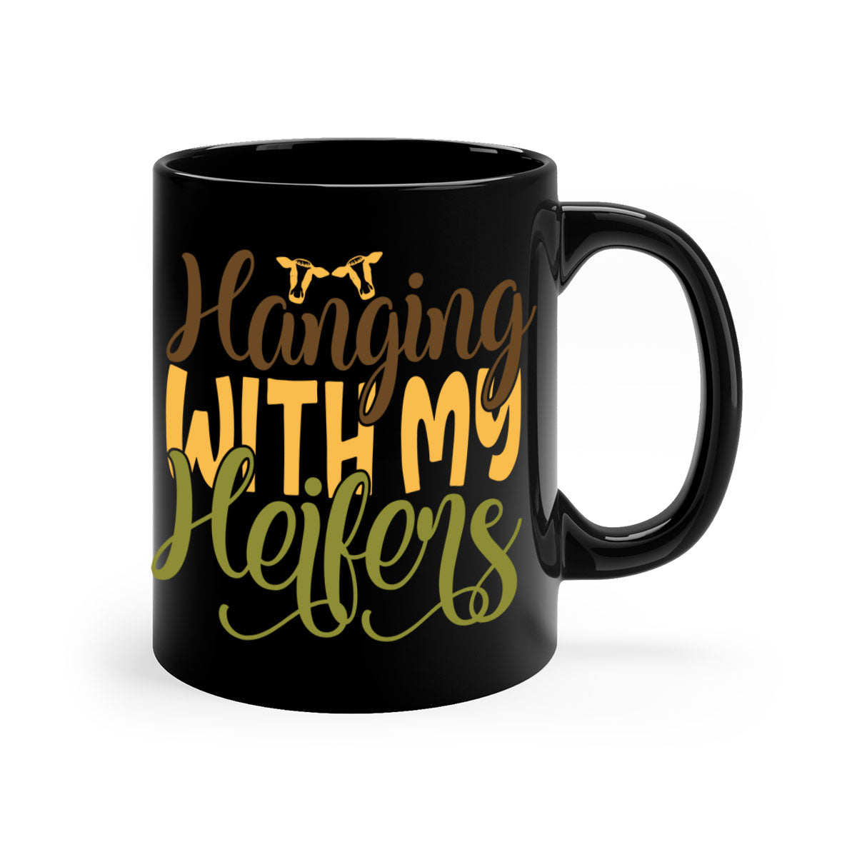 A two-tone ceramic mug with a colorful handle and interior, featuring the phrase 'Hanging with My Heifers' in a glossy finish.