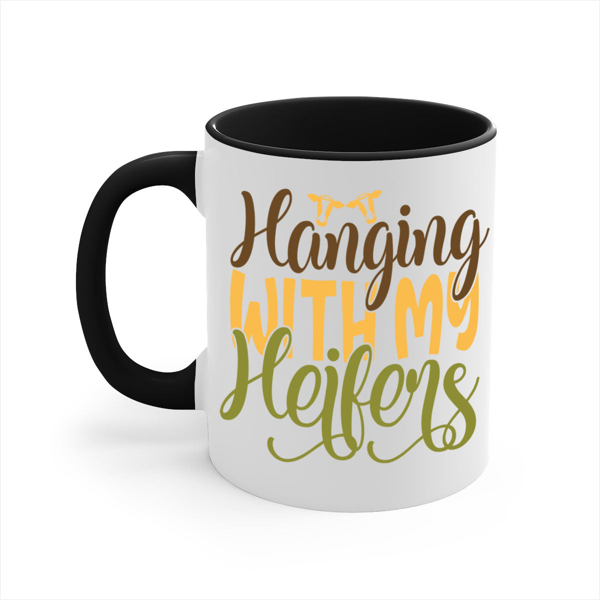 A two-tone ceramic mug with a colorful handle and interior, featuring the phrase 'Hanging with My Heifers' in a glossy finish.