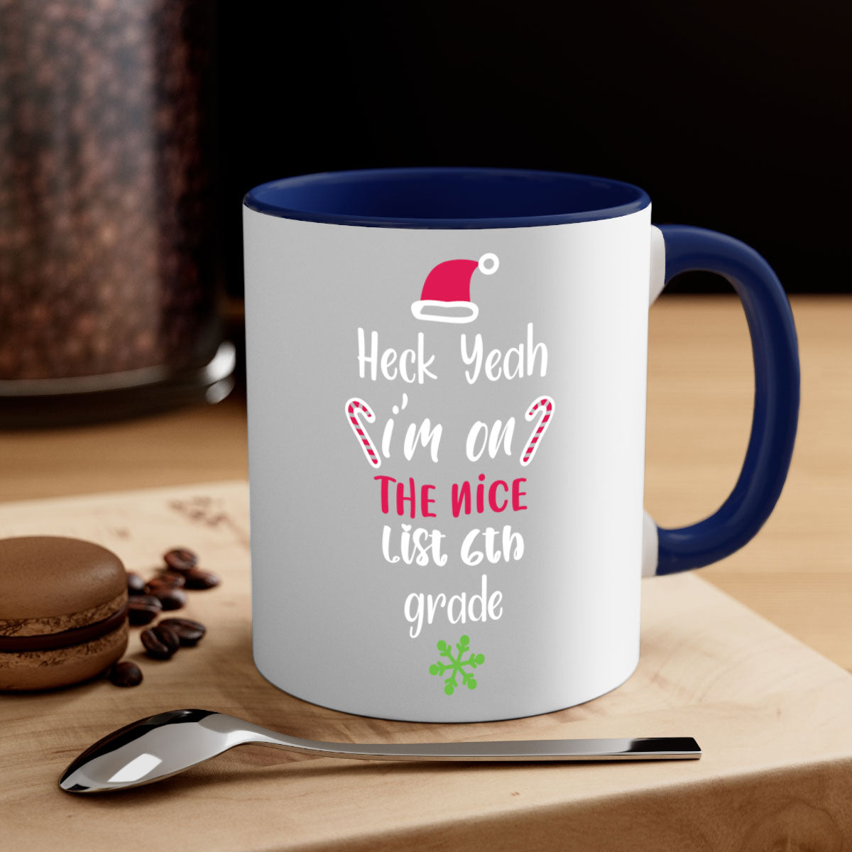 A colorful two-tone ceramic mug with the phrase 'Heck Yeah I'm on the Nice List' printed on it, featuring a glossy finish and a C-shaped handle.