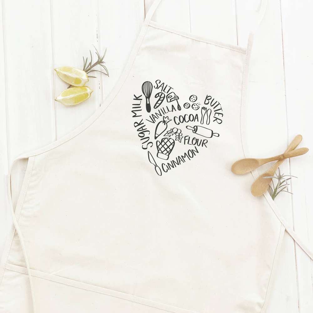 Holiday Baking Heart Women's Apron in cotton canvas with elegant design and divided front pocket.