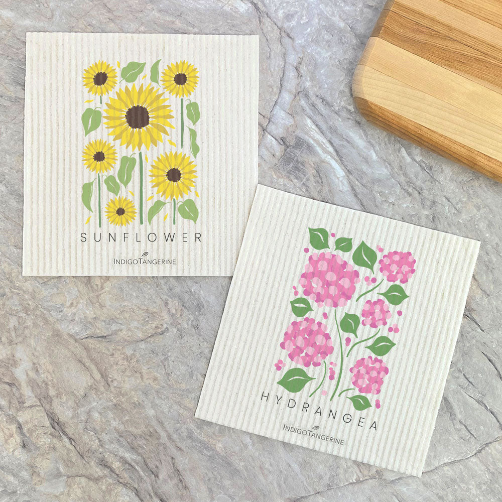 Eco-friendly Hydrangea and Sunflower Swedish dish cloths, showcasing vibrant floral designs.