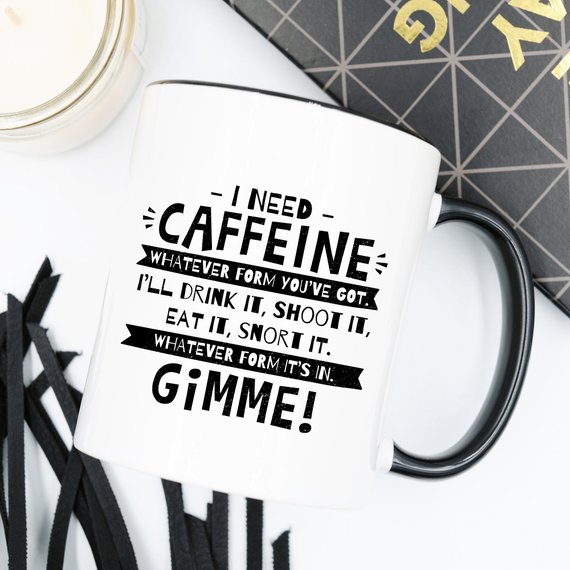 Funny coffee mug with humorous caffeine quote, perfect for coffee lovers.